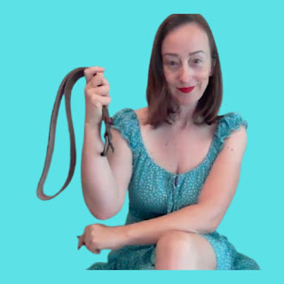 Miss Jenn Davis holding the belt