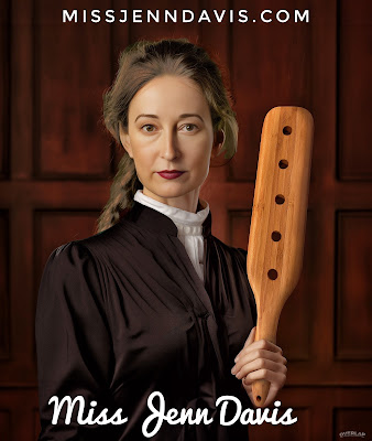 Judge Jenn Davis holding a paddle - Miss Jenn Davis