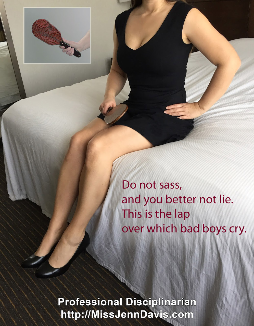 Seattle spanker, Seattle spanking, Miss Jenn Davis, Professional Disciplinarian. lap, woman holding a paddle