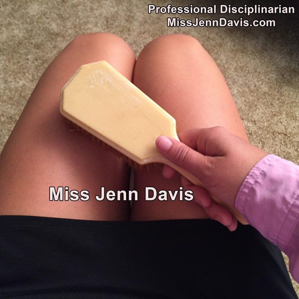 Seattle spanker, Seattle spanking, professional disciplinarian Miss Jenn Davis lap photo, hairbrush spanking,
