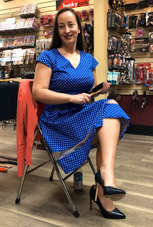 Miss Jenn Davis holding hairbrush