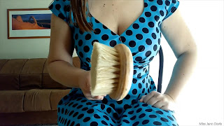 Professional Disciplinarian Miss Jenn Davis holding the bathbrush