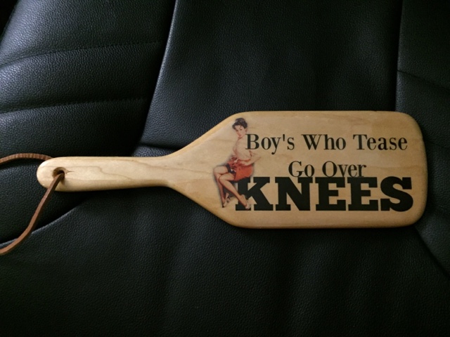 Boys who tease go over knees spanking paddle owned by Miss Jenn Seattle spanker, Seattle spanking, professional disciplinarian
