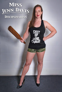 Professional Disciplinarian holding a paddle