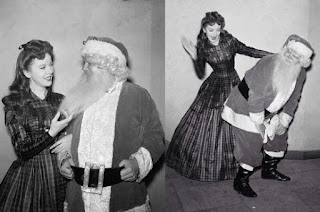 woman spanking Santa