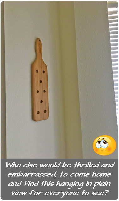paddle hanging on the wall