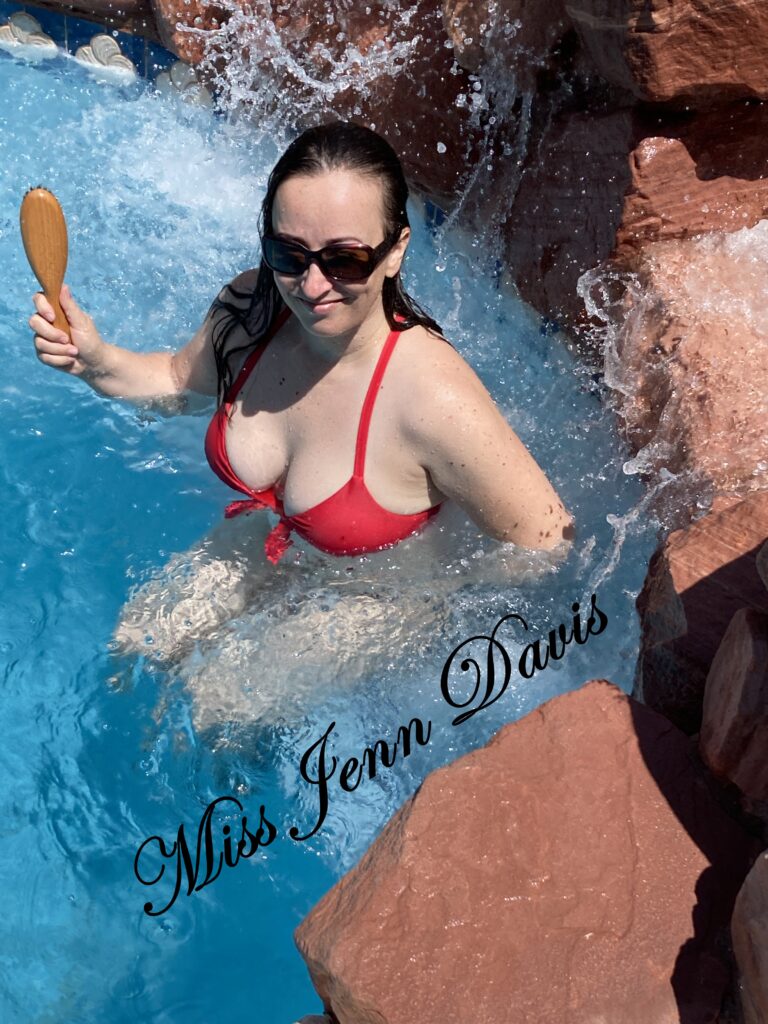pool spanking, hairbrush spanking in the pool in Las Vegas by Miss Jenn Davis, a Seattle-based Disciplinarian and spanking model