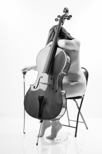 Fine Art photography. Miss Jenn Davis laying exhausted over the cello. art nude